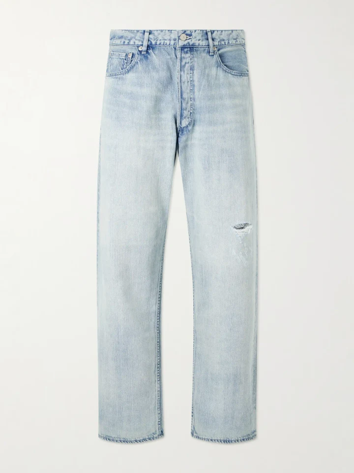 Pale blue Auralee wide-leg jeans, photographed flat