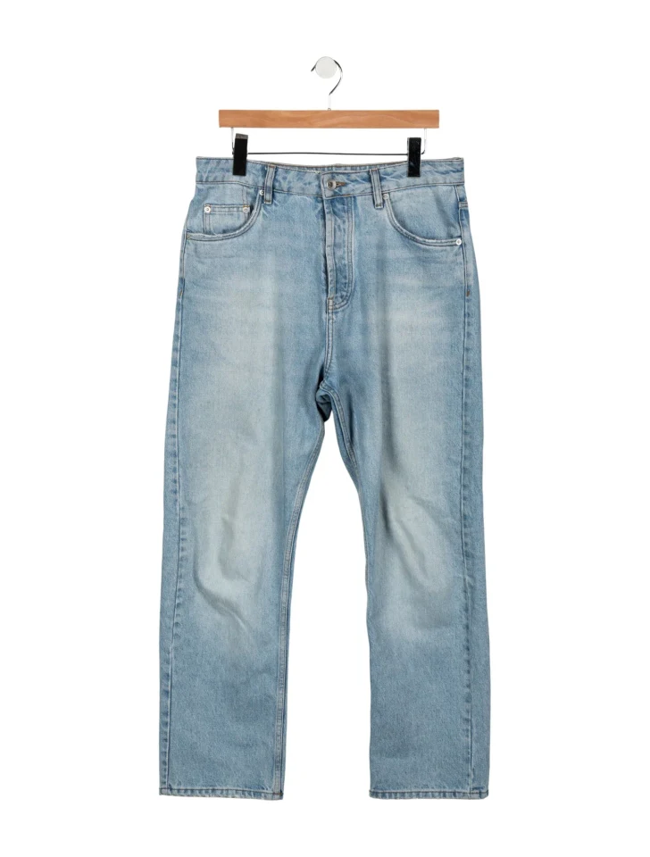 Studio Nicholson light-wash jeans from the saved resale listing